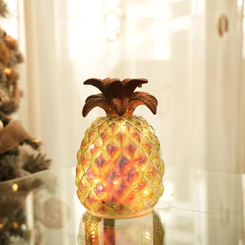 Varavīksnes efekta stikla ananāsa lampa.